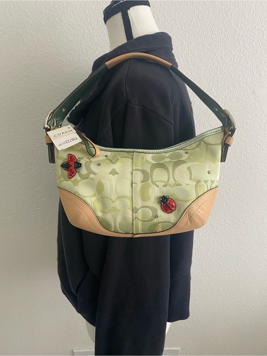 Coach Handbags - Coach Green Signature Canvas Shoulder Bag with Tan Leather Trim